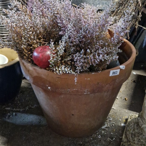 863 - Large terracotta pot filled with heather.