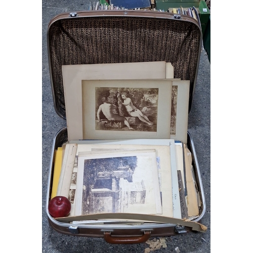 886 - Collection of vintage art prints and photographs in a suitcase, featuring classical and landscape sc... 