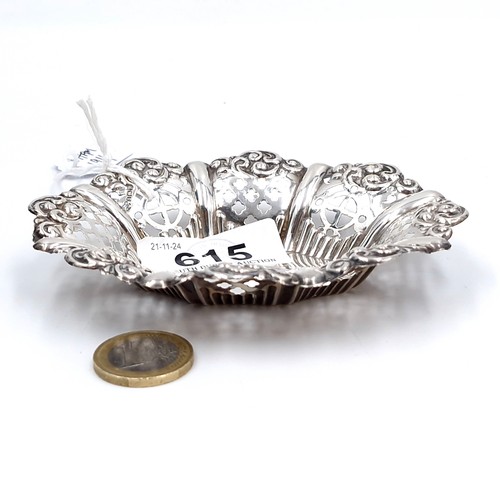 615 - A sterling silver pin dish hallmarked Birmingham - 1914. Weight - 16.5 grams.