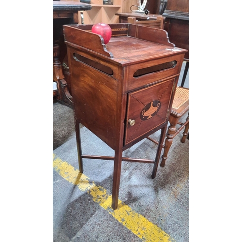 703 - Star Lot : Georgian mahogany bedside cabinet with gallery top and decorative inlay, featuring a sing... 