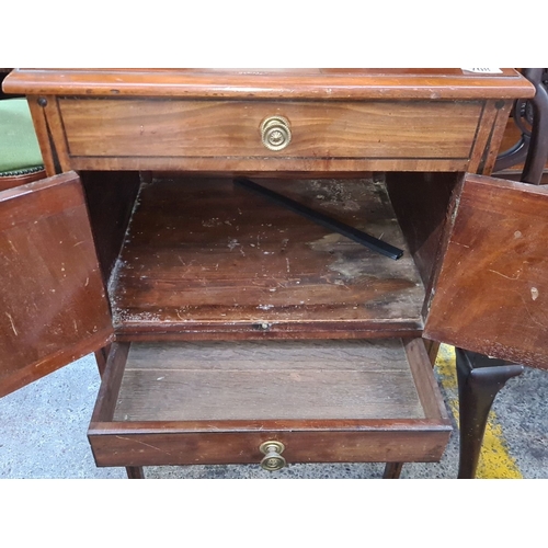 708 - Vintage mahogany bedside cabinet with single drawer and double-door storage. From the mid-20th centu... 