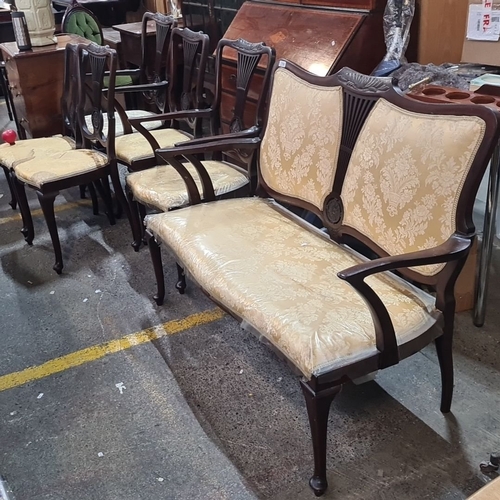 710 - A six piece mahogany Edwardian parlour suite including love sets, chairs with ornate carvings and up... 