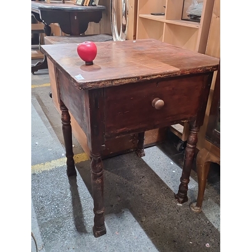 716 - Antique mahogany side table with single drawer and turned legs, from the late 19th century.