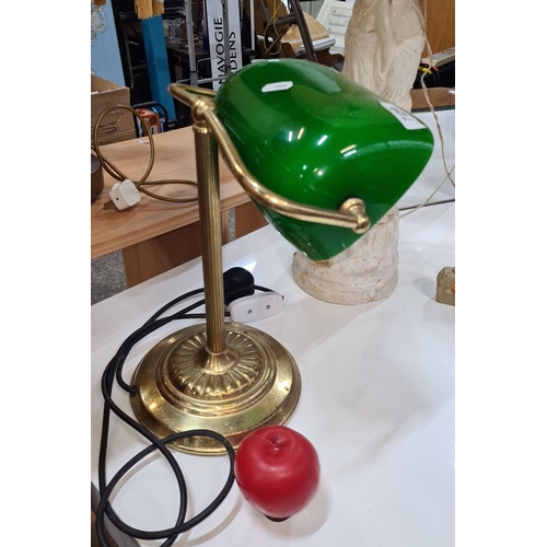 729 - Brass banker's lamp with green glass shade, Mid-Century Modern design, features adjustable brass arm... 