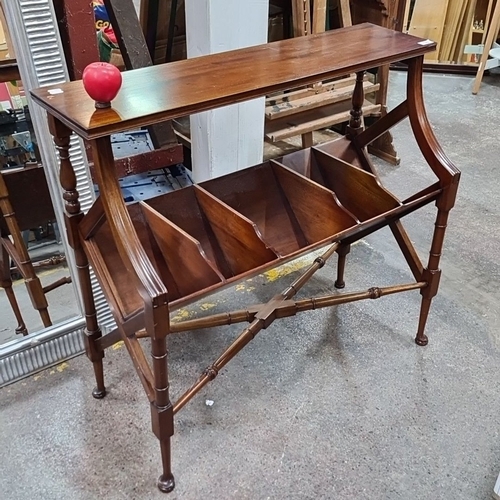 739 - Edwardian mahogany Canterbury with turned supports and dividers, supported on a delicate stretcher f... 