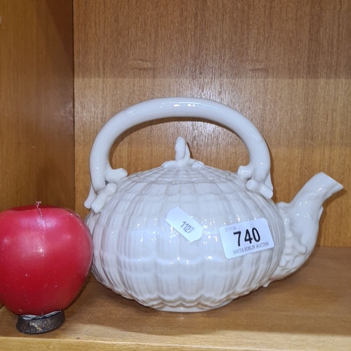 740 - Star Lot : A fabulous Black stamp White ceramic teapot from Belleek, lovely shape and design. In ver... 