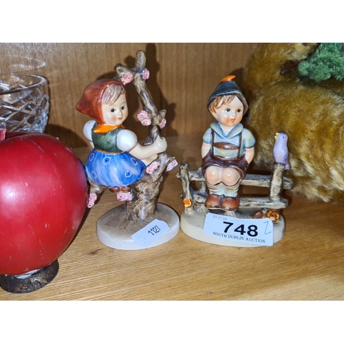 748 - Porcelain sculptures showcasing classic Bavarian children motifs. All in very good condition.