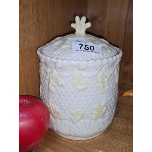 750 - Belleek porcelain jar with lid, featuring shell and coral motifs. Marked Belleek, Ireland. Creamy bo... 