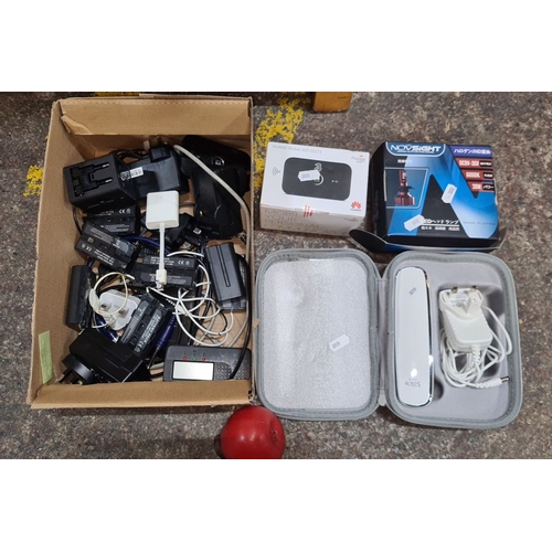 764 - Mixed electronics lot including battery packs, chargers, Huawei mobile WiFi E5573, and Nighteye LED ... 