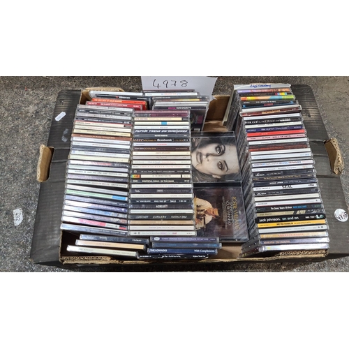 779 - Collection of 100+ CD albums featuring various artists and genres, including Adele, Shania Twain, an... 