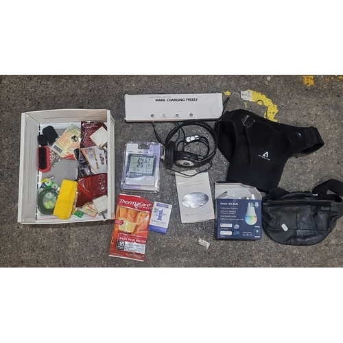 814 - Mixed lot featuring 2  wireless chargers, headphones, adjustable fanny pack, smart LED bulb, tempera... 