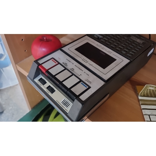 816 - Portable cassette recorder C-102 with owner's manual, featuring volume and tone control, condenser m... 