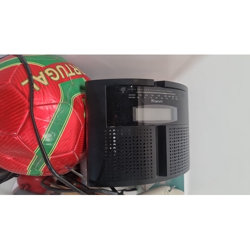 831 - Mixed lot includes model airplane, red Portugal football, clock radio, and other miscellaneous items... 