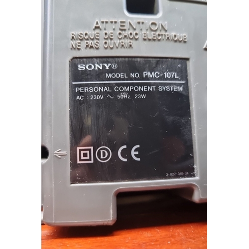 838 - Sony PMC-107L Personal Component System features Mega Bass and 8 times oversampling digital filter. ... 