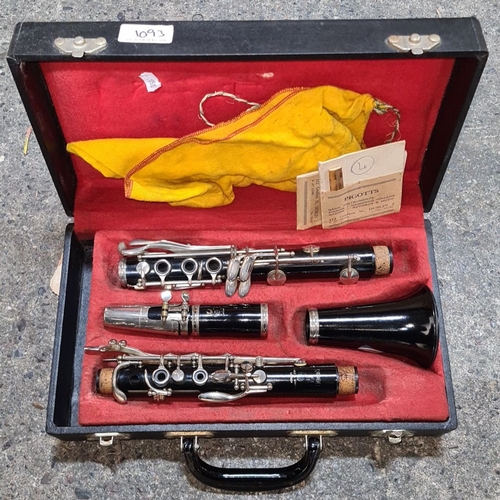 1093 - Picott's clarinet in black case, includes cleaning cloth and paperwork. Complete set disassembled in... 