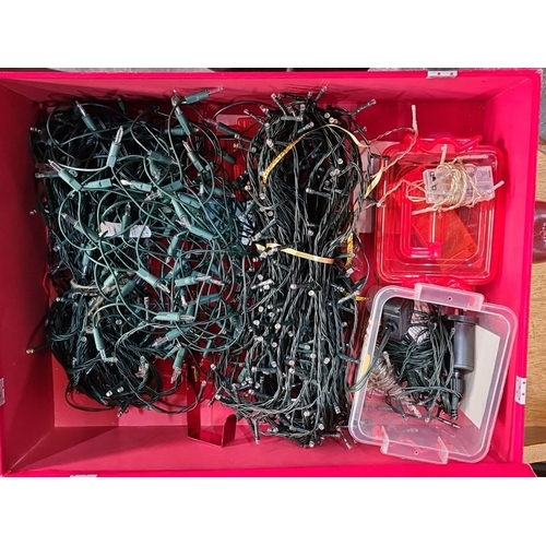 1129 - Box of assorted Christmas string lights, various lengths and styles, neatly organized in a red stora... 