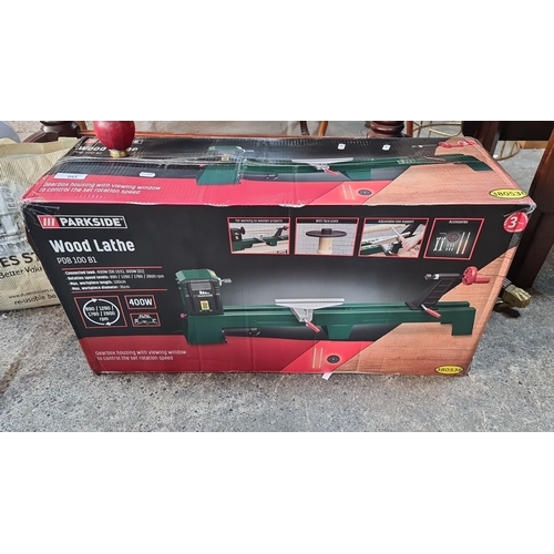 1146 - A new in box Parkside Wood Lathe PDB 100 B1, 400W, includes face plate and adjustable tool support. ... 