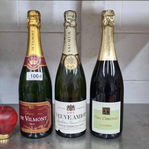 1004 - Three bottles of sparkling wine including a 750ml bottle of De Vilmont Brut (€49 vivino.com), a 75cl... 