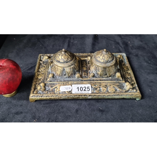 1025 - An antique heavy brass Double inkwell. Features Floral motifs.