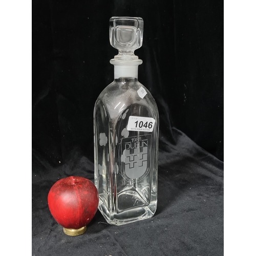 1046 - A commemorative Dublin decanter with original stopper. In good condition.