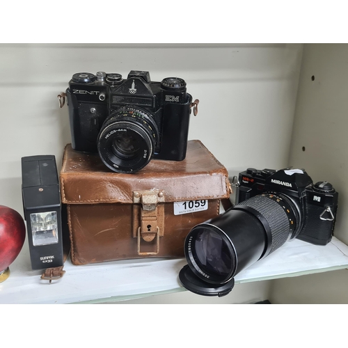 1059 - Two vintage cameras including a Miranda M5-2 Super 35mm film camera accompanied by a Mitsuki MC 300m... 