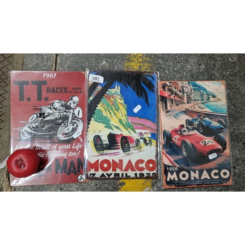 1083 - Three printed metal wall signs of vintage posters advertising Monaco and Isle of Man racing.