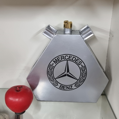 1084 - A silver toned Mercedes petrol cannister with brass screw top.