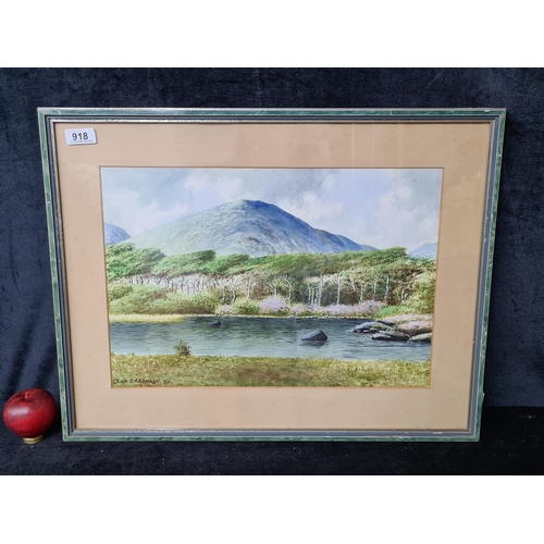 918 - A serene 1950 original 'Leon O Kennedy' watercolour on paper painting. Features a picturesque landsc... 