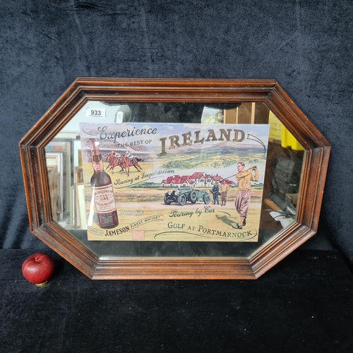 933 - A heavy vintage Pub mirror. With print of a Dublin Whiskey advertisement. Housed in an octagonal sol... 