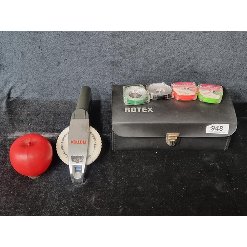 948 - A vintage Rotex label making kit. Complete with label tape in five different colours and case. Comps... 