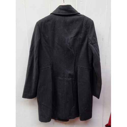 1305 - DKNY black wool coat, size 16, featuring asymmetrical zipper and shawl collar.
Previous in auction o... 