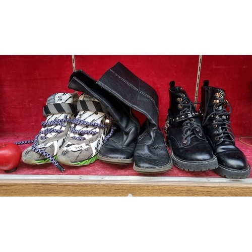 1310 - Three pairs of Boots, including a pair of slip on Dr Martin style boots, size UK 5, a pair of black ... 