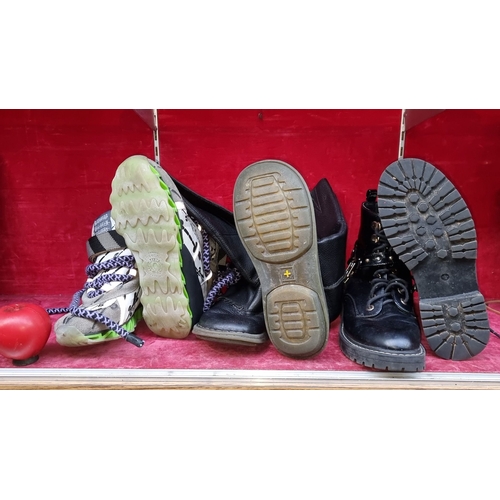 1310 - Three pairs of Boots, including a pair of slip on Dr Martin style boots, size UK 5, a pair of black ... 