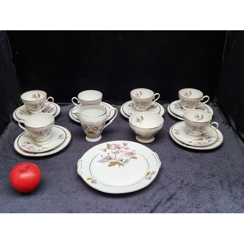 1313 - A very pretty 21 piece Walbrzych Polish porcelain Tea set. Includes six plates, saucers, cups, sandw... 