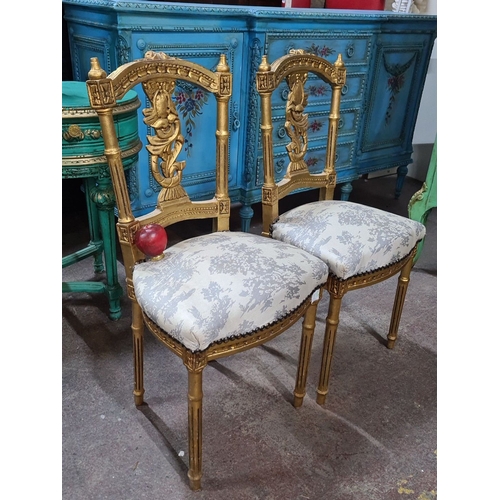 1383 - Star lot : Pair of Neoclassical-style giltwood chairs with intricately carved backs and upholstered ... 