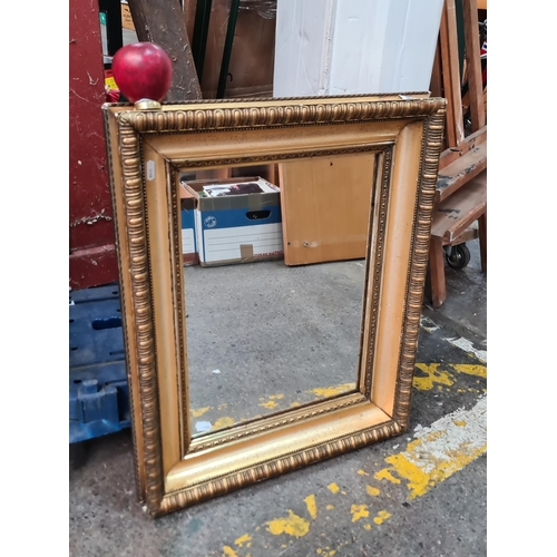 1187 - A large vintage bevelled mirror, a good heavy quality mirror. 
MM: 80cm x 60cm.