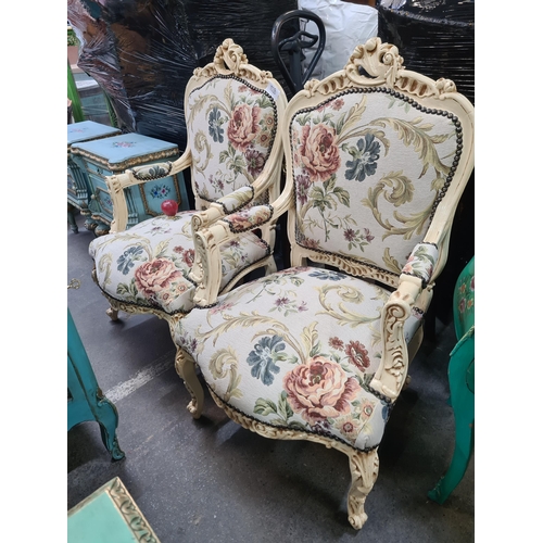 1228 - Star Lot : A magnificent large pair of French Louis XV Style armchairs. Upholstered in a floral tape... 