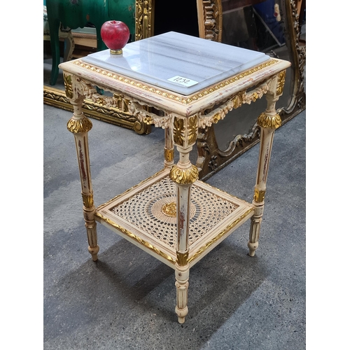 1232 - Start lot : A fabulous Baroque style side table with a cold Italian marble top and caned shelf benea... 