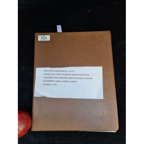 337 - A folder containing Irish postal memorabilia, album of all sorts, Saorastat Eireann envelopes, antiv... 