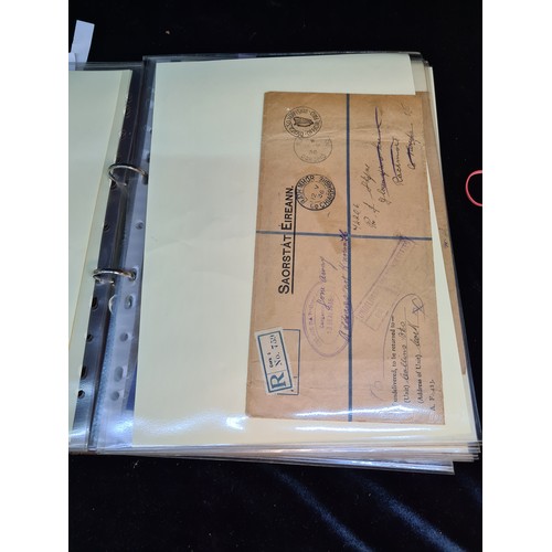 337 - A folder containing Irish postal memorabilia, album of all sorts, Saorastat Eireann envelopes, antiv... 