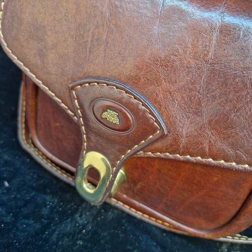 182 - A fabulous quality 'The Bridge' tan leather hand bag with brass hardware. Comes with original dust b... 