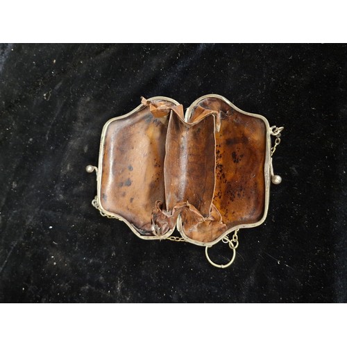 280 - Two antique and vintage accessories including a Victorian EPNS chatelain coin purse with original in... 