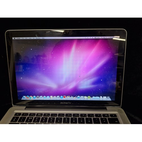 287 - An Apple Macbook Pro 2010 laptop with charger