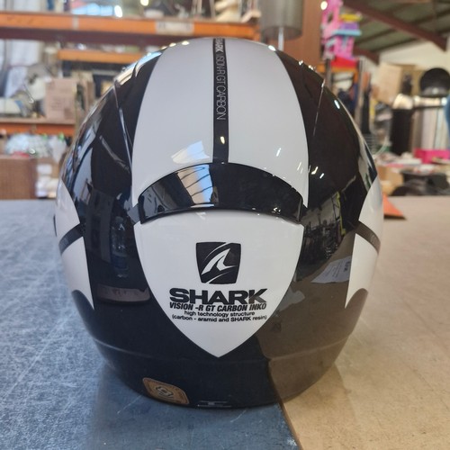 331 - An as new Shark Vision R Carbon helmet in black, size large. In its original box. RRP €169.00 with a... 