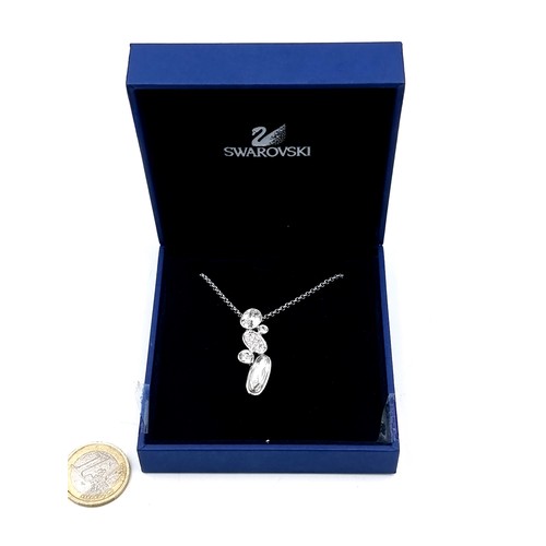 258 - A lovely Swarovski Crystal pendant necklace. Presented in original box and packaging. Comes with cer... 