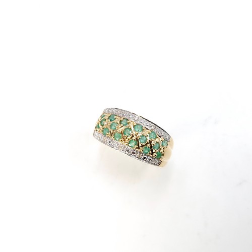 49 - Star Lot : A stunning good weight 14 carat gold (585) emerald and diamond cluster ring. Size - R. We... 