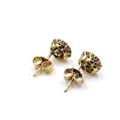 60 - A pair of sapphire and diamond stud earrings set in nine carat gold. Total weight - 1.13 grams.