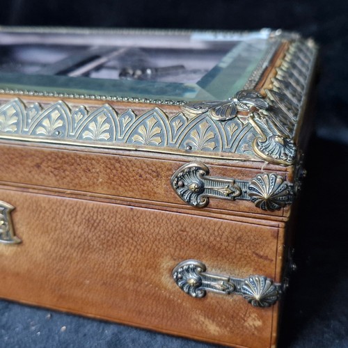 1024 - Star lot :An attractive antique jewellery box. With beautiful padded purple grey silk interior linin... 