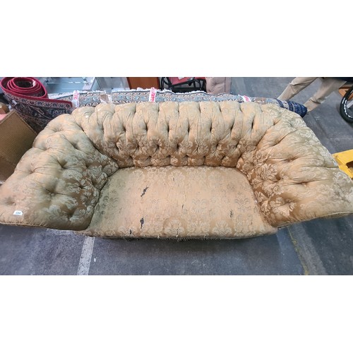 654 - Star Lot : A fabulous roll back Victorian Chesterfield button sofa / couch features luxurious silk d... 