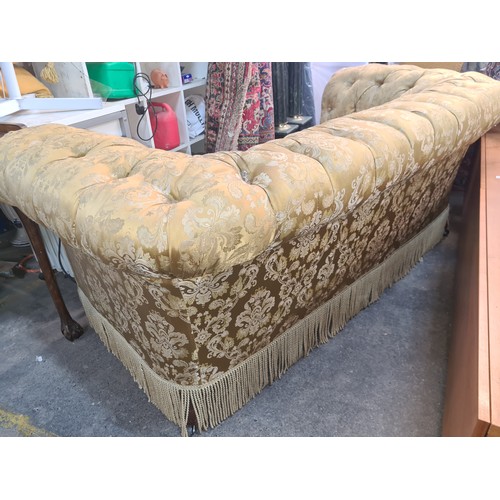 654 - Star Lot : A fabulous roll back Victorian Chesterfield button sofa / couch features luxurious silk d... 